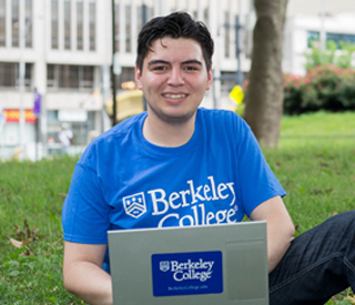 Male student on laptop mobile image