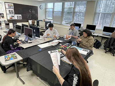 graphic design students in classroom