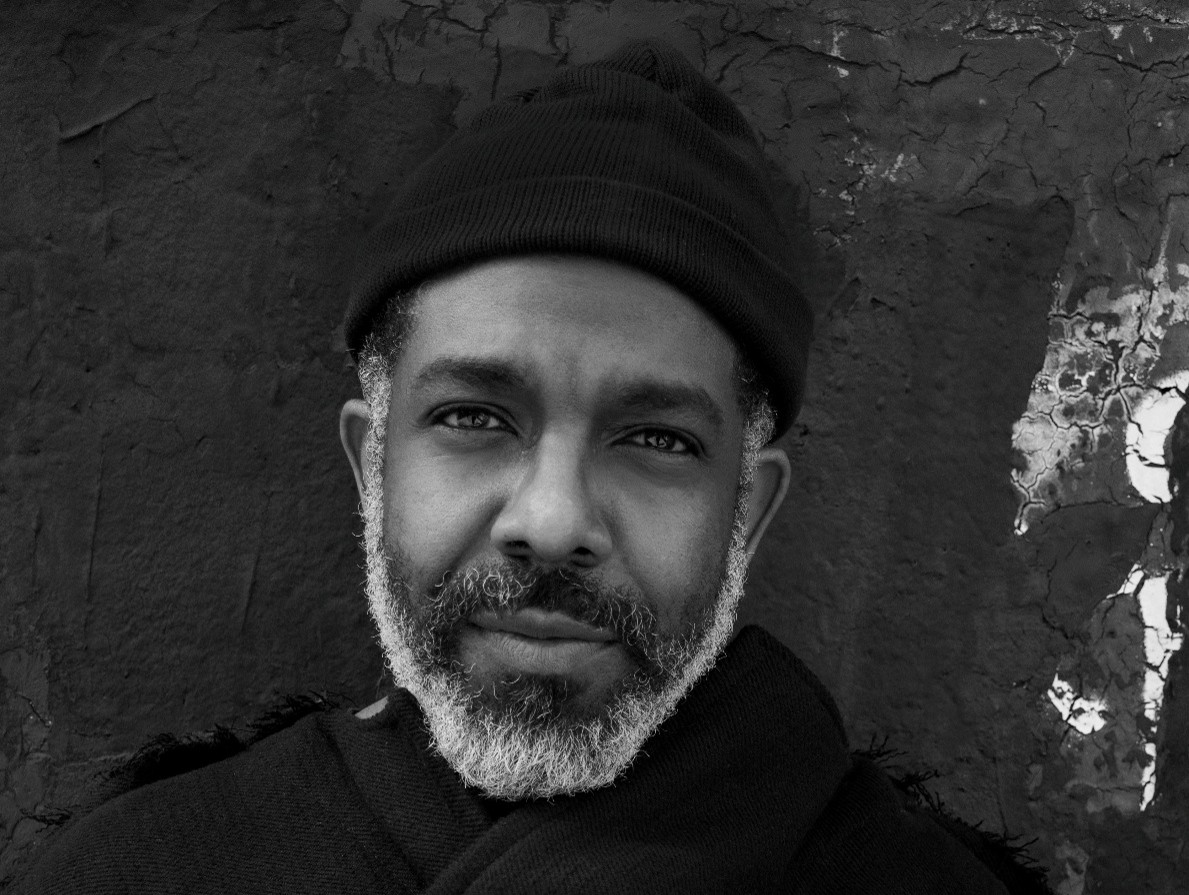 Black and white headshot of fashion designer Aaron Potts