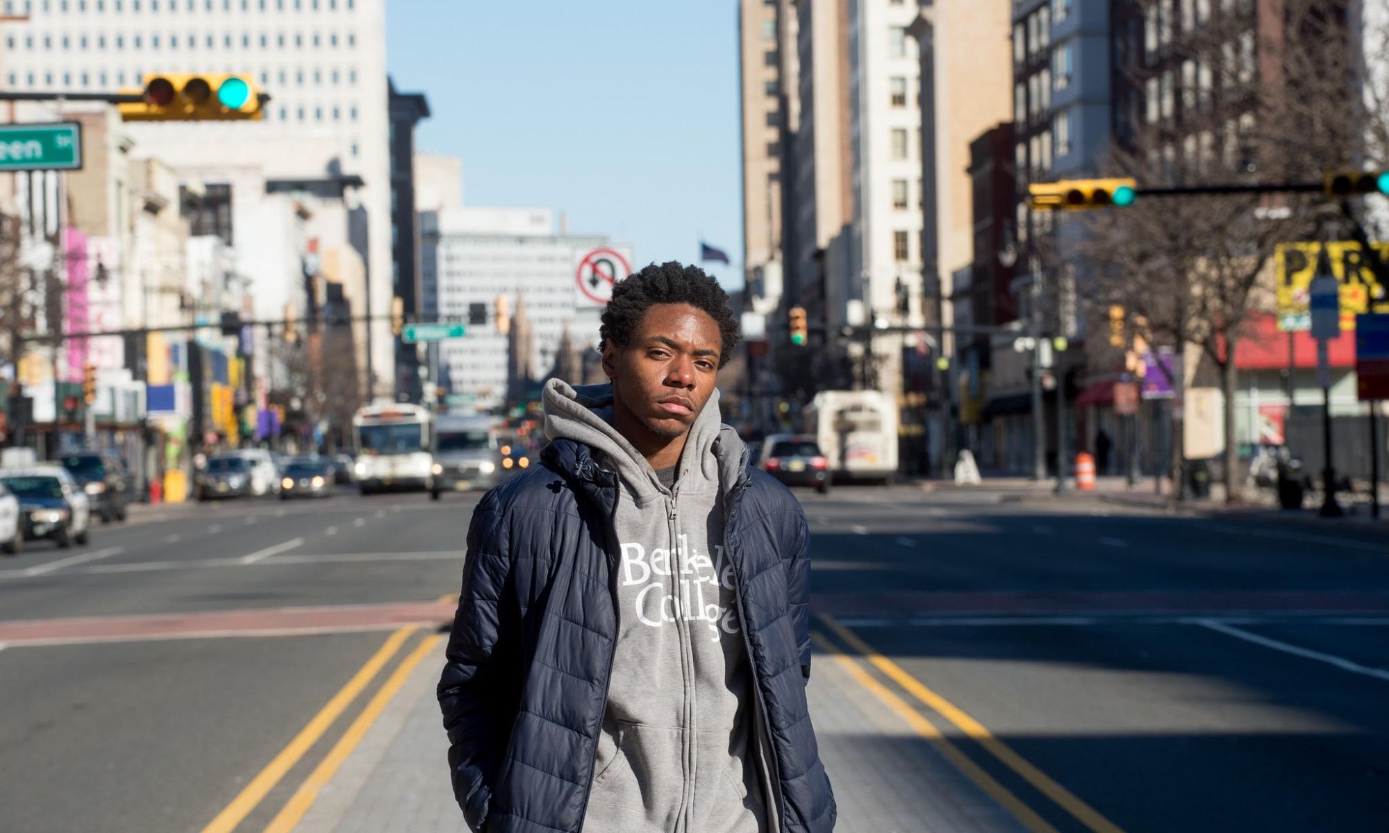 Student, Khali Raymond standing in a Newark Street 