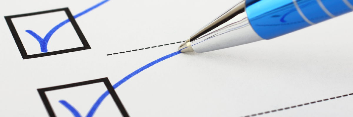 Image of check boxes checked off with a pen