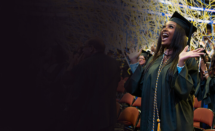 A scene from a graduation ceremony showcasing the phrase "Commencement 2025 a celebratory setting