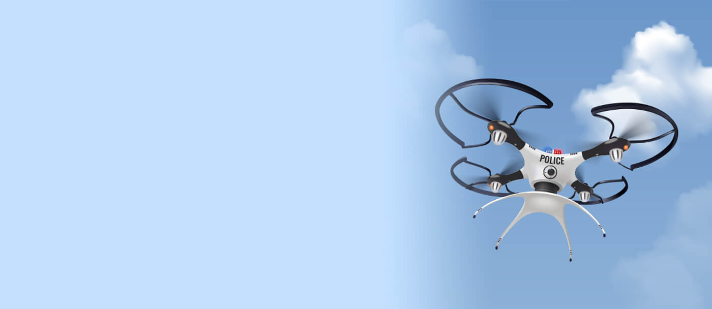 A police drone hovers against a blue sky with fluffy clouds. The drone's sleek design and visible camera suggest surveillance capabilities.