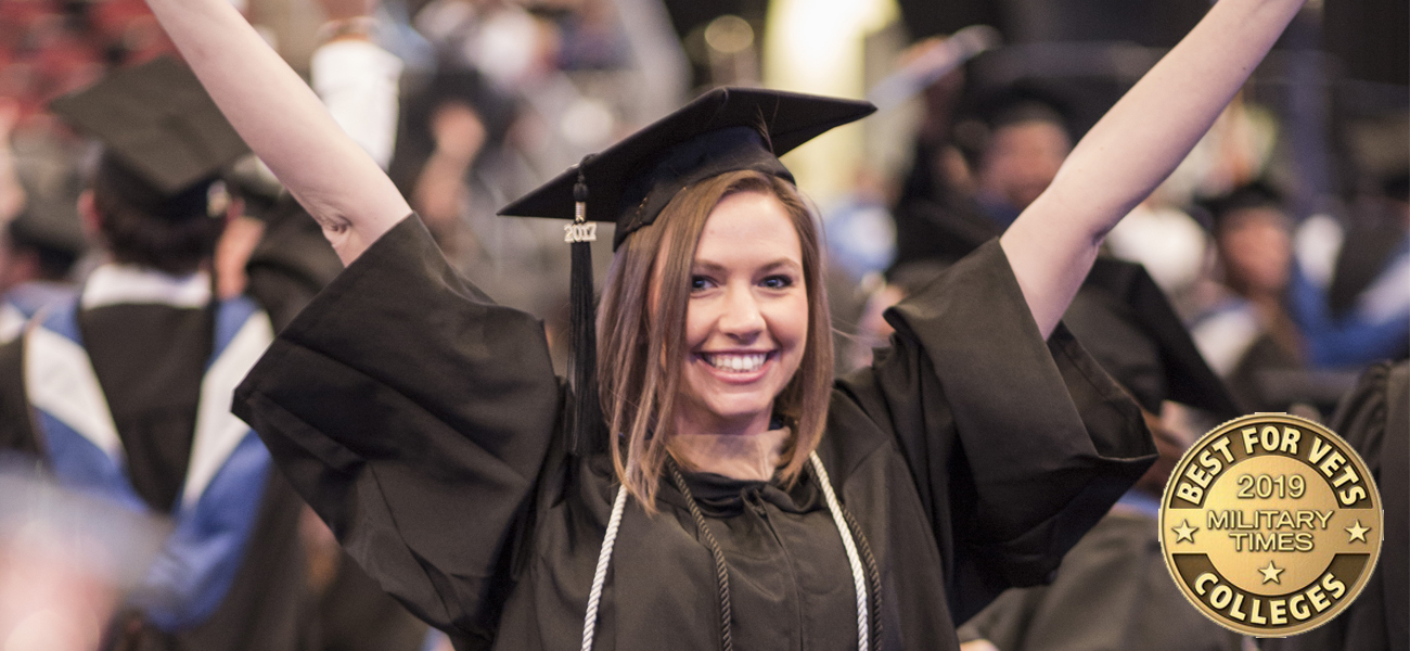 female military student at graduation