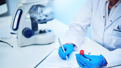 doctor writing on a desk