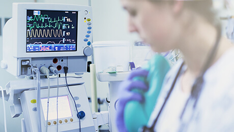 doctor in front of a medical monitor