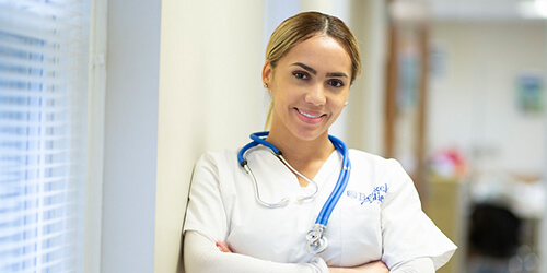 image of a healthcare professional in white scrubs