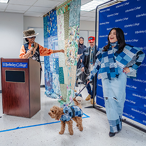 A woman and her small dog model matching denim outfits.