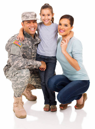 A soldier and his family smiling together for a photo, capturing their love and bond
