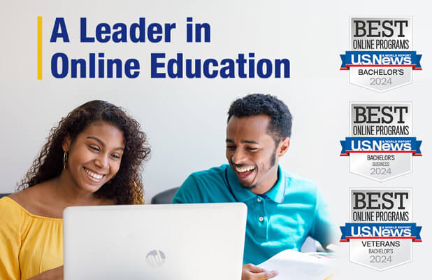 online students smiling while working in front of a laptop