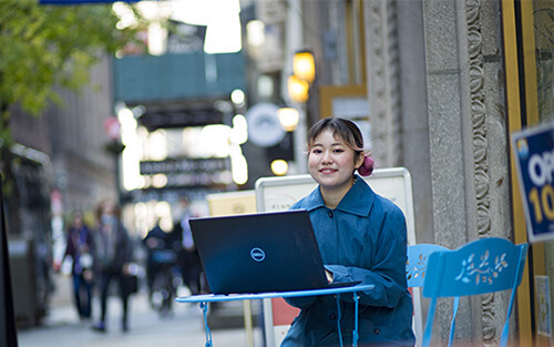 Rennert student in a outside table 