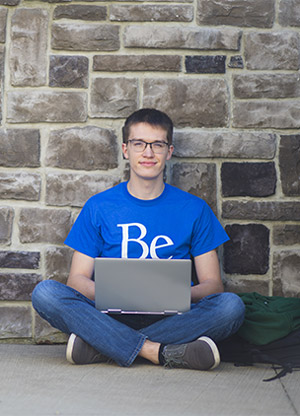 Berkeley College student with a laptop