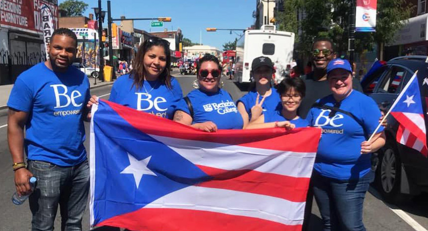 Berkeley students and staff display the Puerto Rican flag at a parade.