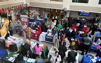 Employers and potential employees in a cafeteria for a career fair