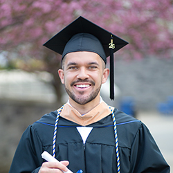 A headshot of Andre Krzyzanowski.