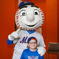 Mets mascot and boy